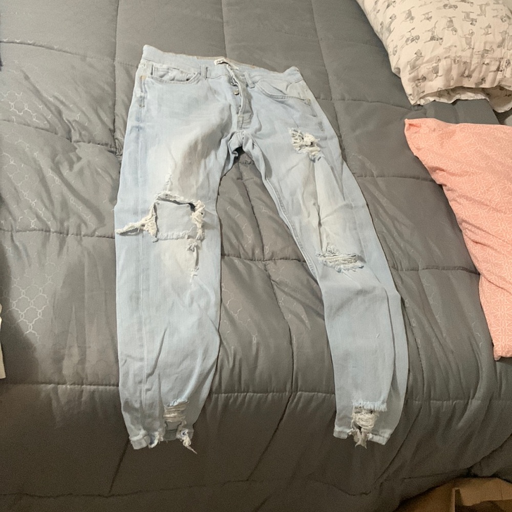 Zara men’s ripped jeans.
